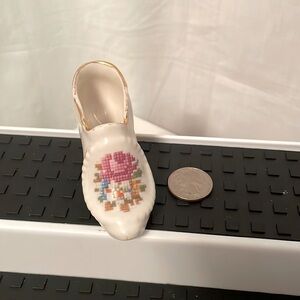 Vintage porcelain miniature collectible shoe with cross-stitch look, From 1920s